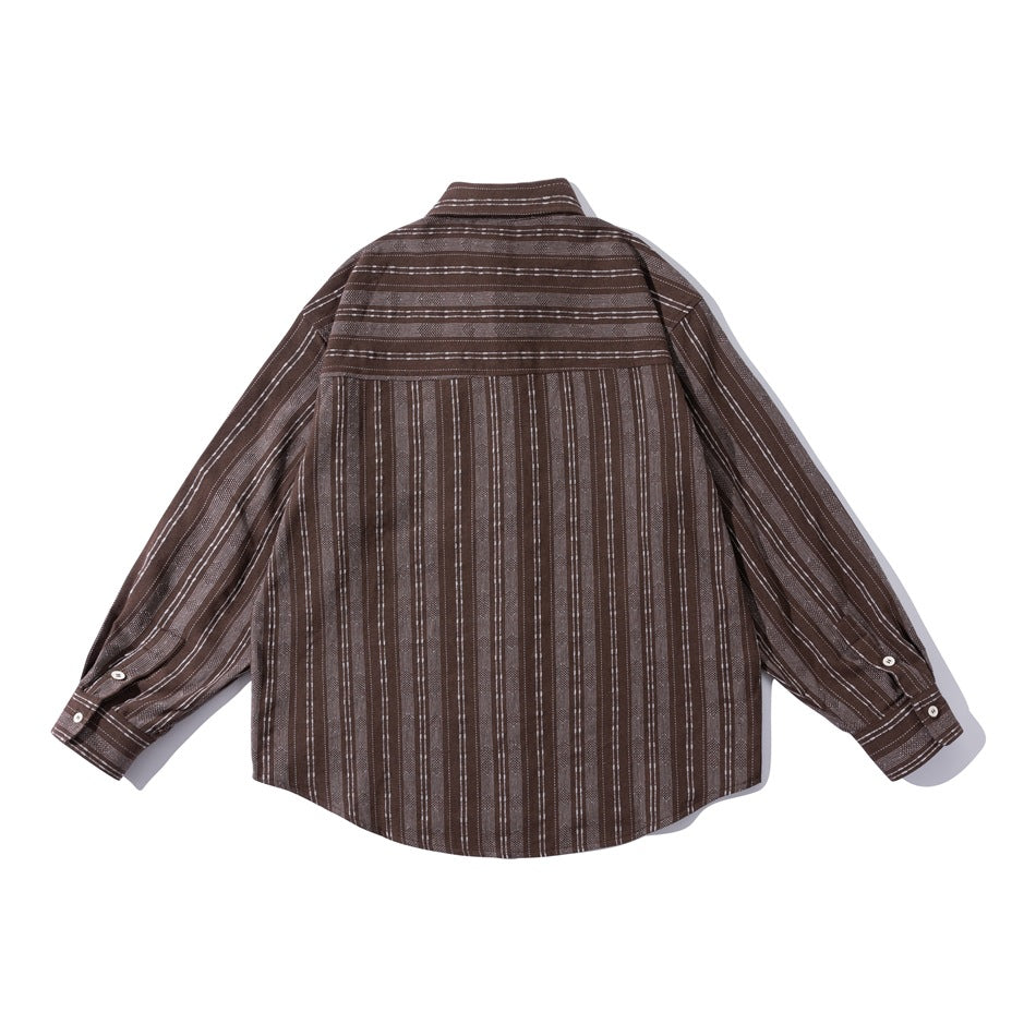Back view of brown striped long-sleeve shirt with horizontal-striped yoke and button cuffs, laid flat