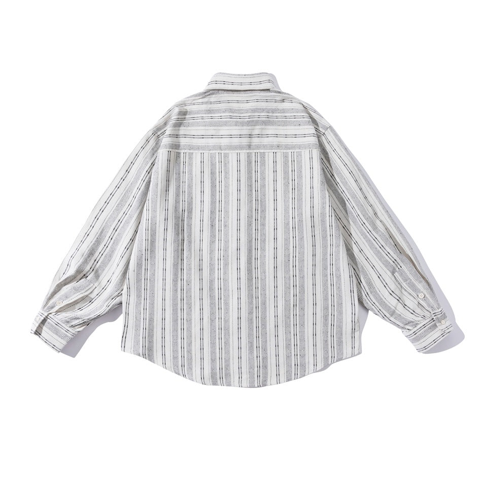 Back view of a light-colored long-sleeve button-up shirt with narrow gray vertical stripes, laid flat on white.