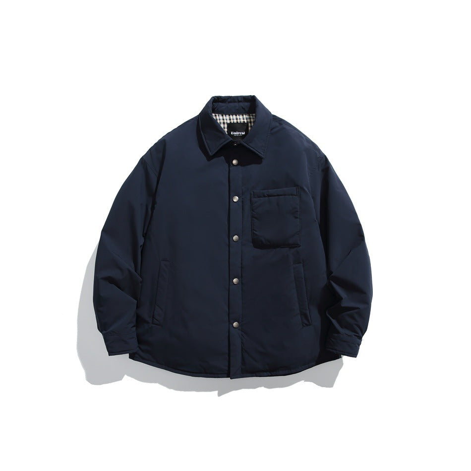 Navy collared jacket with snap-button front, chest patch pocket, and two slanted hand pockets, shown flat against white.