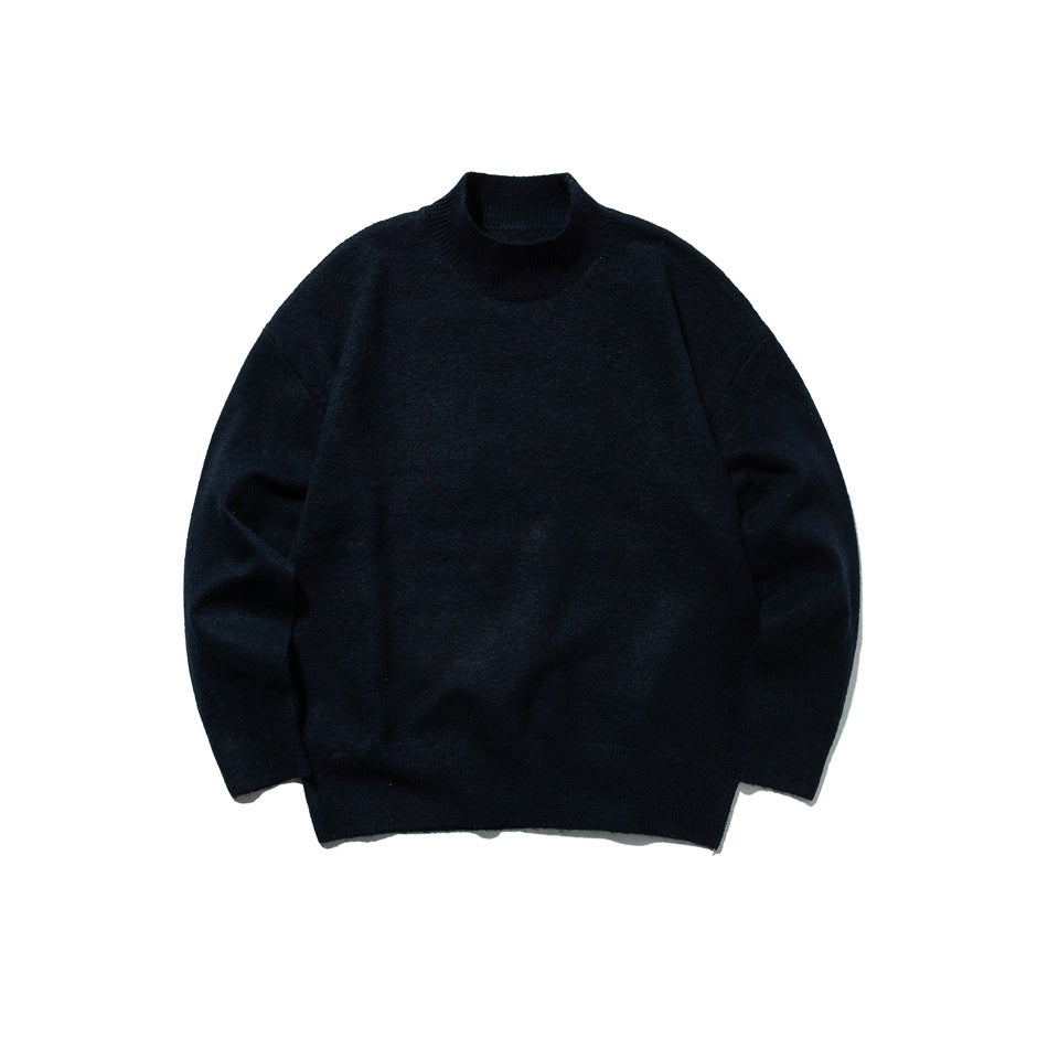 Navy mock-neck knit sweater flat lay, front view, with long sleeves and ribbed trim
