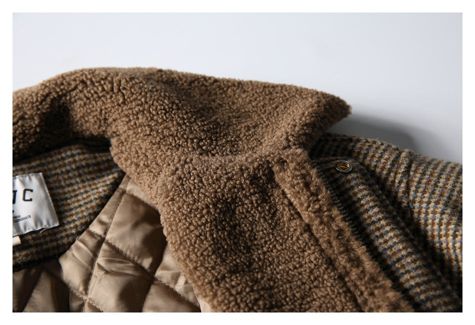 Close-up of the coat's brown textured collar, checked outer fabric, and tan quilted lining.