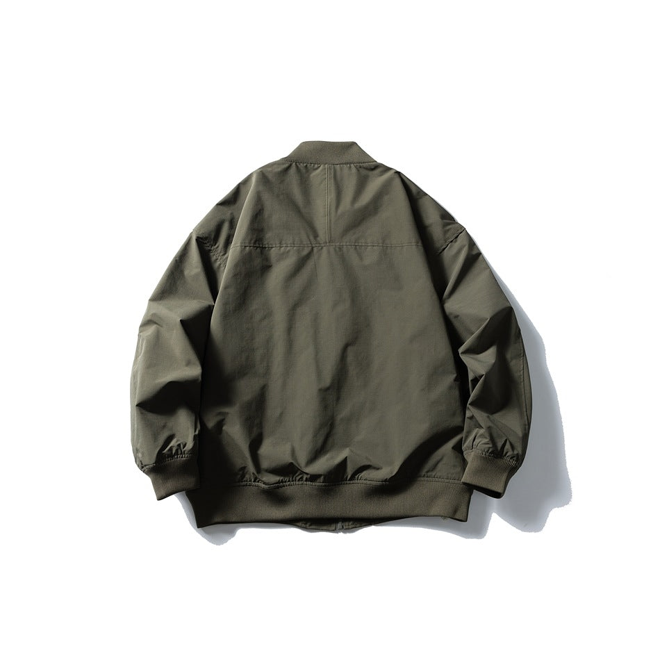 Back view of an olive bomber jacket with a ribbed collar, cuffs and hem and a horizontal upper-back seam.