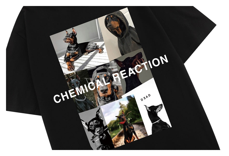 Front view of a black T-shirt laid flat, printed with a collage of dog photos and large white lettering.