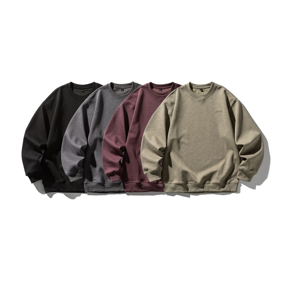 Four crewneck sweatshirts displayed together in black, charcoal gray, burgundy, and taupe.