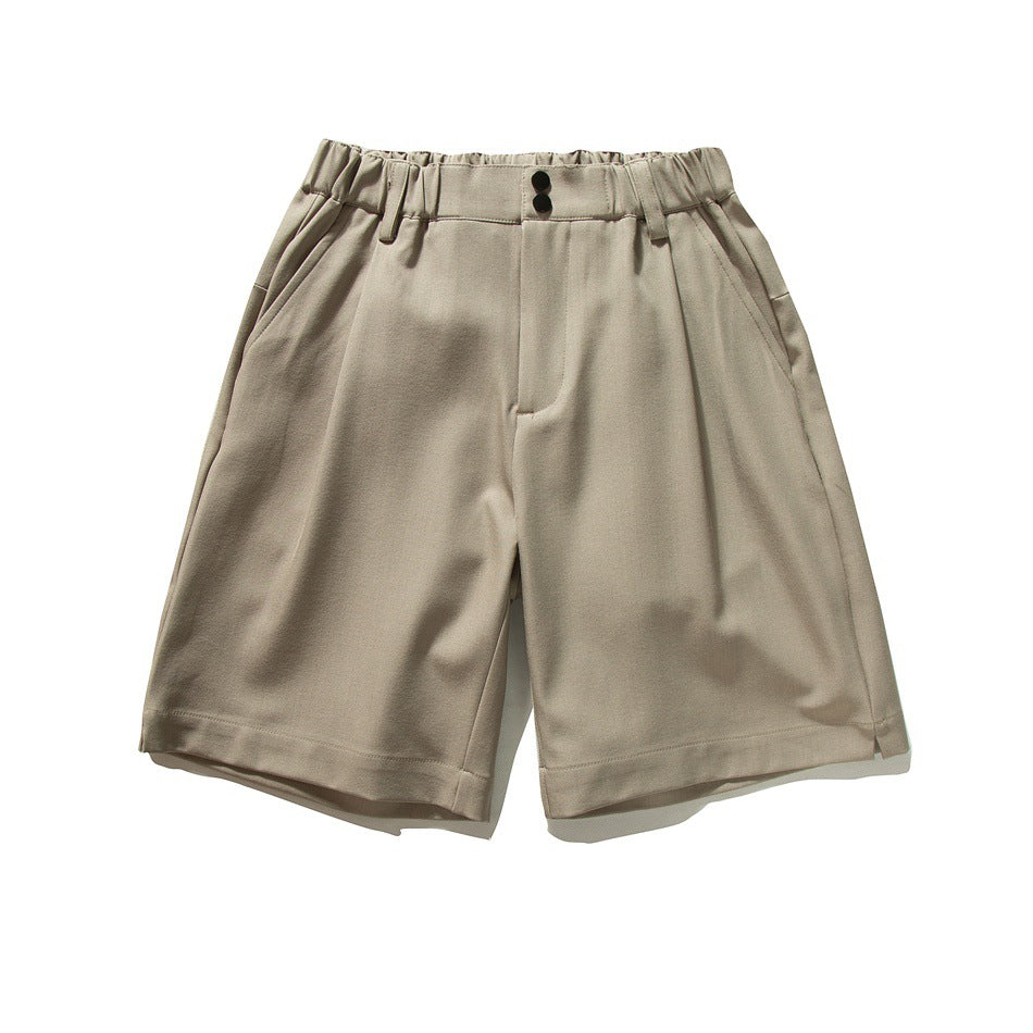Khaki knee-length shorts with elastic waistband, two buttons, front pockets and pleats, flat lay front view