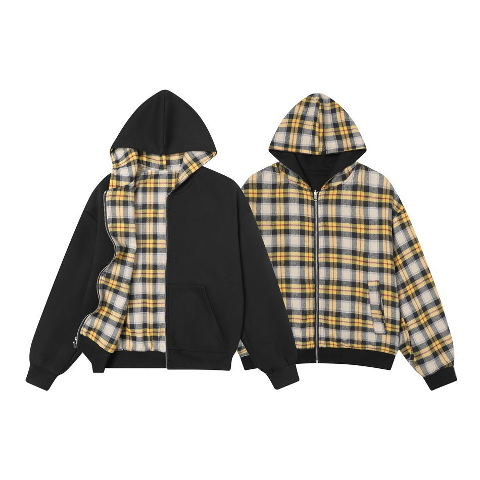 Reversible hooded zip jacket shown with the black side open and the yellow plaid side displayed side by side