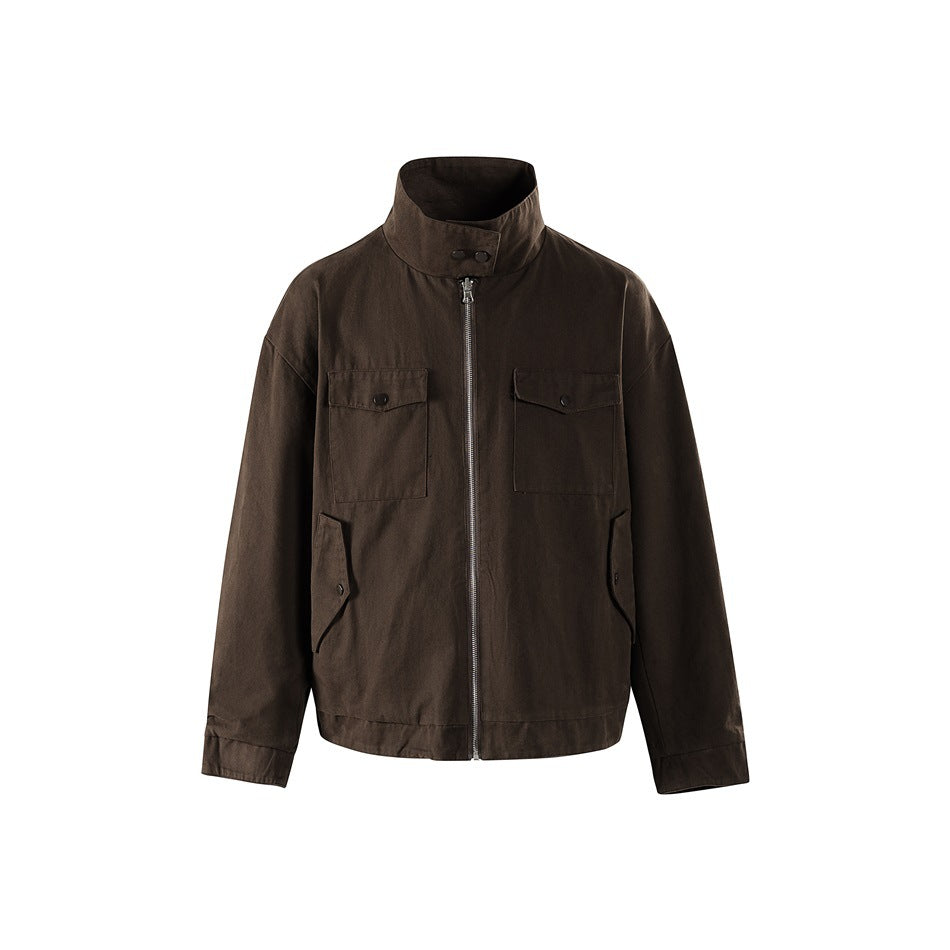 Brown stand-collar zip jacket with chest flap pockets and angled snap pockets, front view on white background