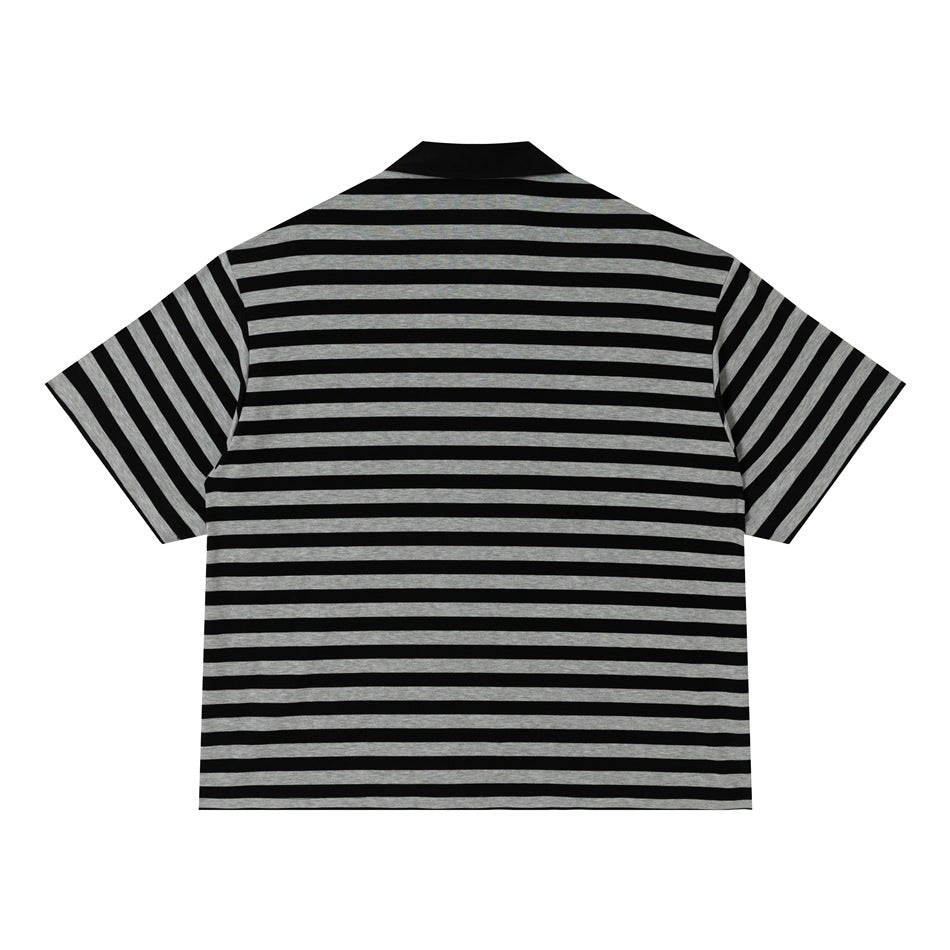 Back view of black and gray striped short-sleeve polo top with black collar and plain striped back