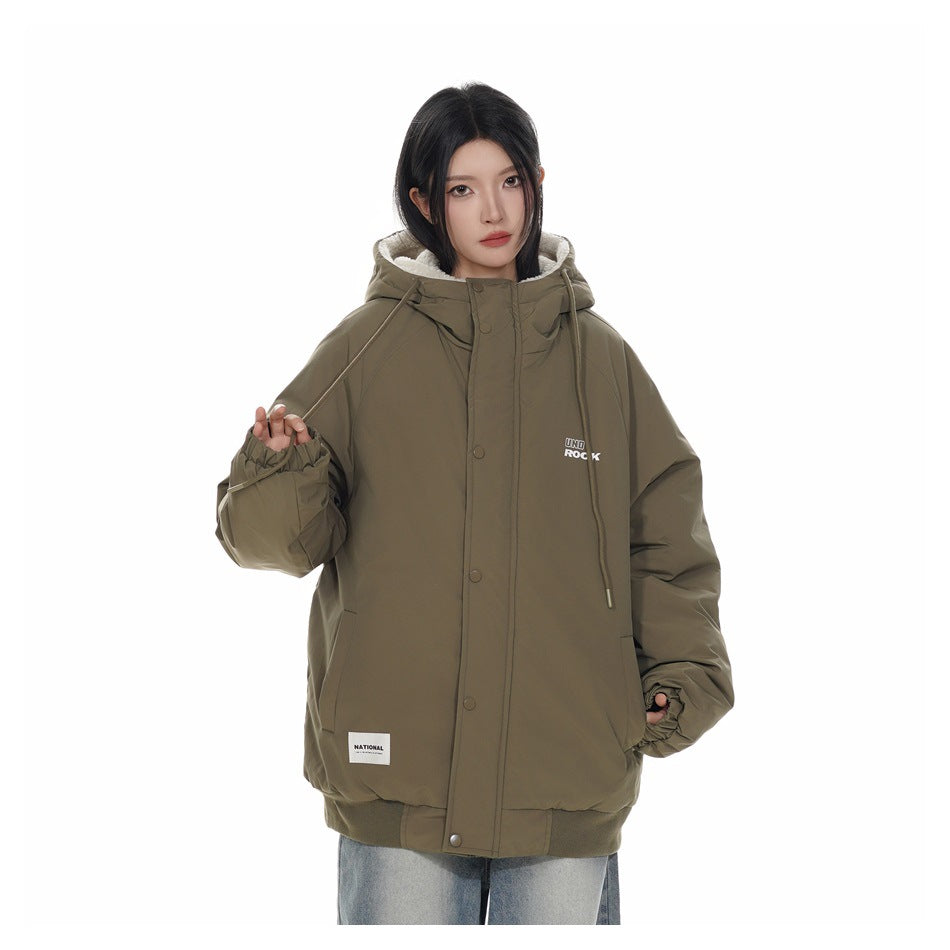 Model wearing an olive green hooded jacket with snap front, drawstring hood and ribbed hem, with light jeans