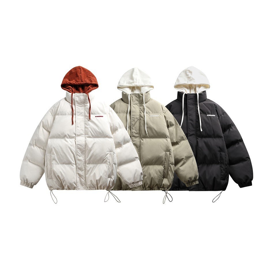 Three hooded puffer jackets shown from the front in white with a rust hood, taupe with a cream hood, and black with a cream