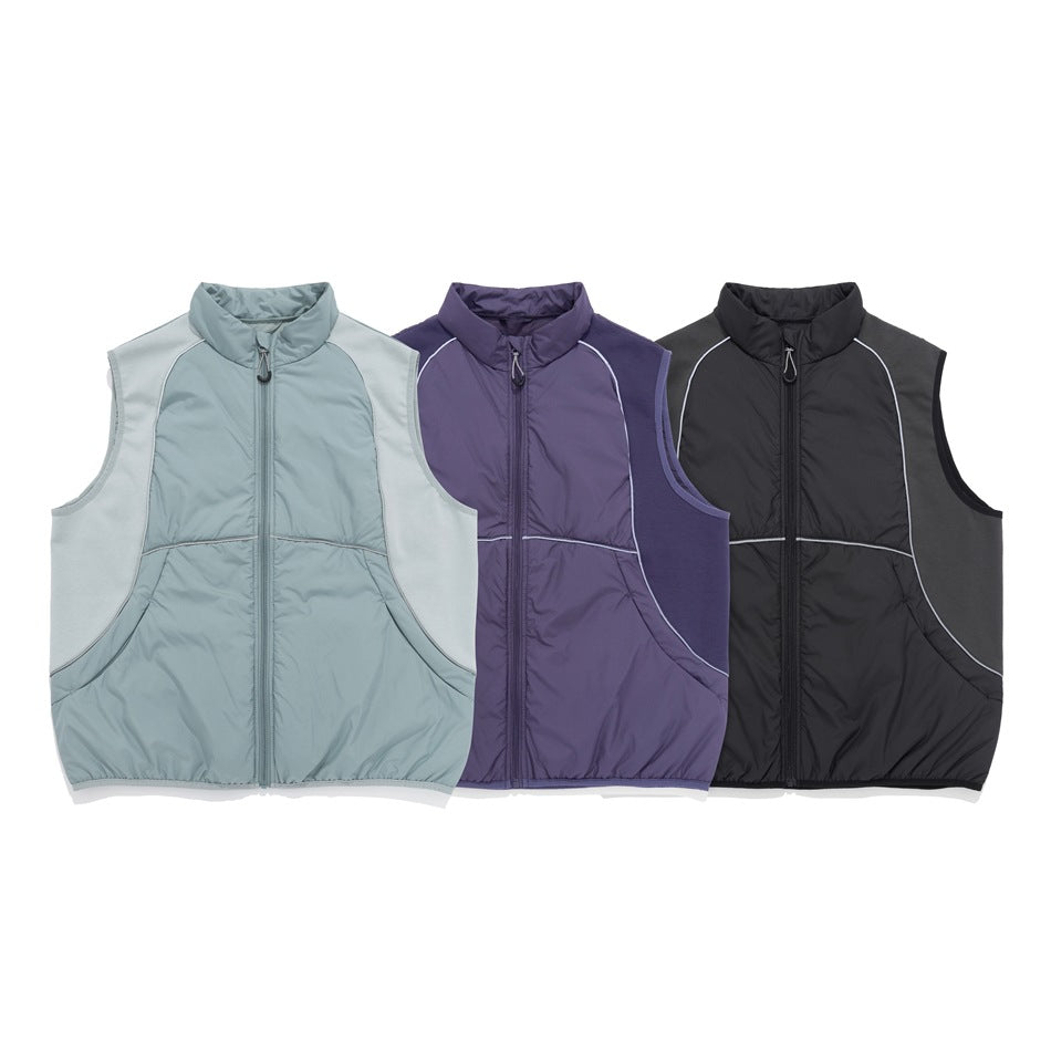 Three sleeveless zip-front vests shown together in pale blue, purple, and black.