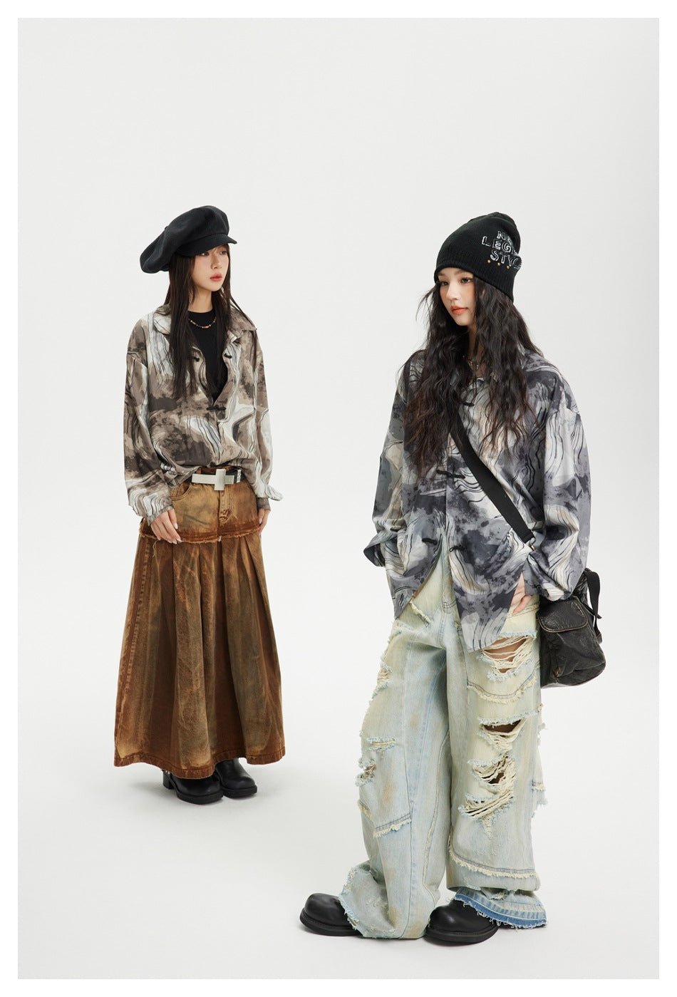 Two models show brown- and gray-toned abstract-pattern shirts, paired with a long brown skirt and distressed light jeans.