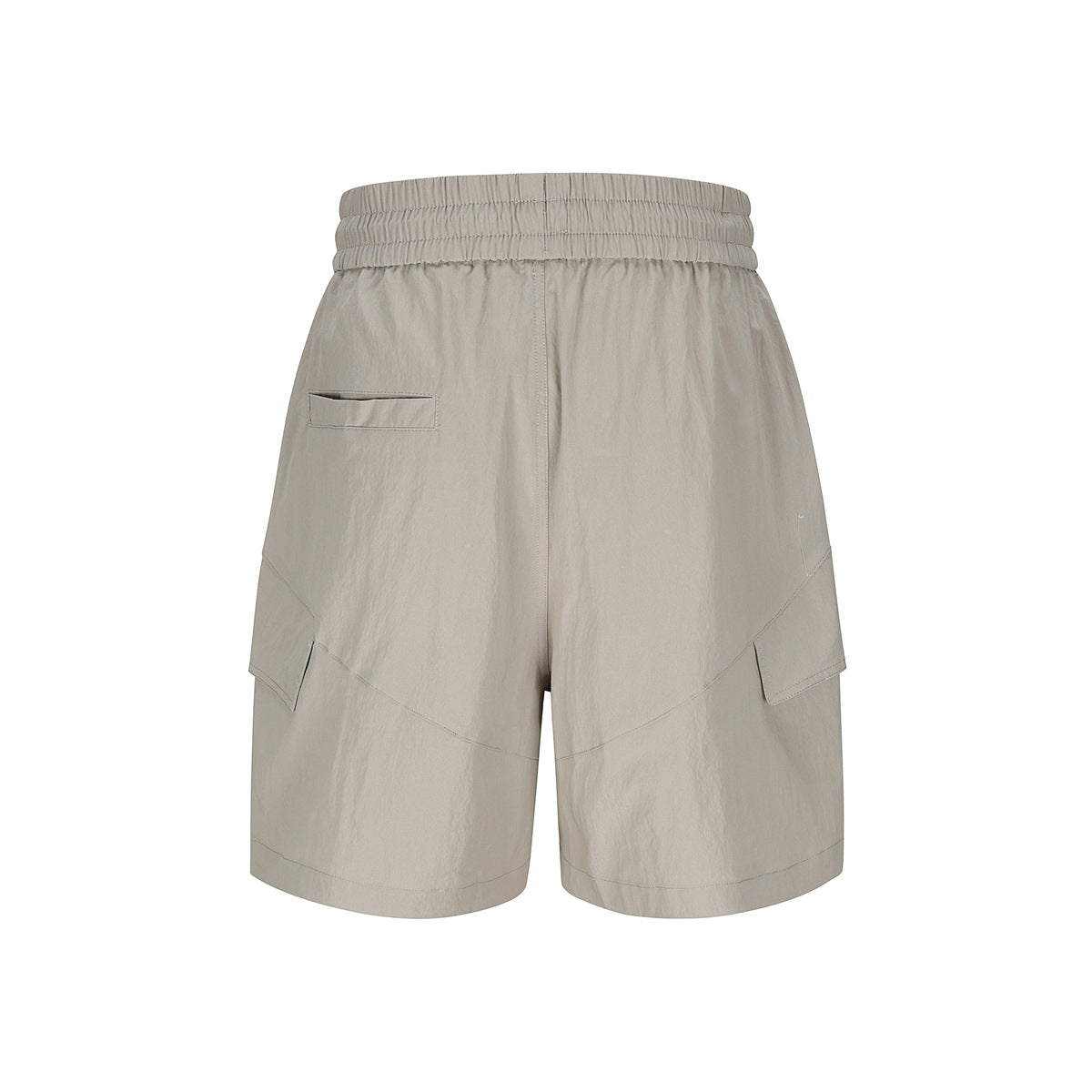 Back view of light beige cargo shorts with an elastic waistband, rear pocket, and flap cargo pockets.