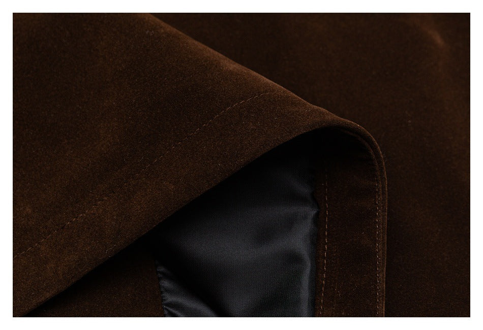 Close-up showing the dark brown jacket's edge and dark interior lining.
