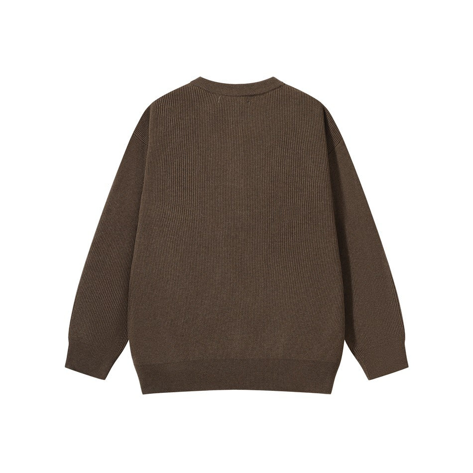 Back view of a brown ribbed sweater with long sleeves, crew neck, and ribbed hem and cuffs.
