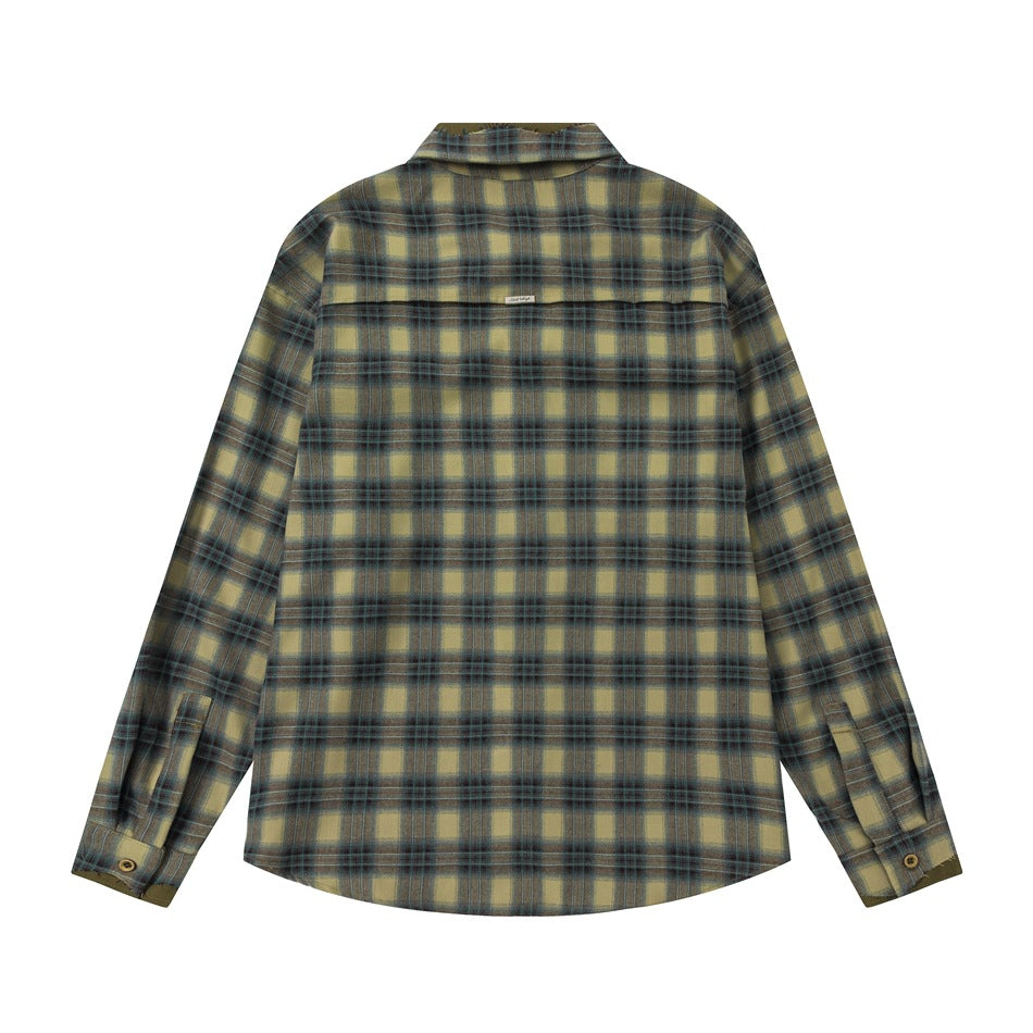 Back view of an olive and beige plaid long-sleeve shirt with a yoke seam and button cuffs.