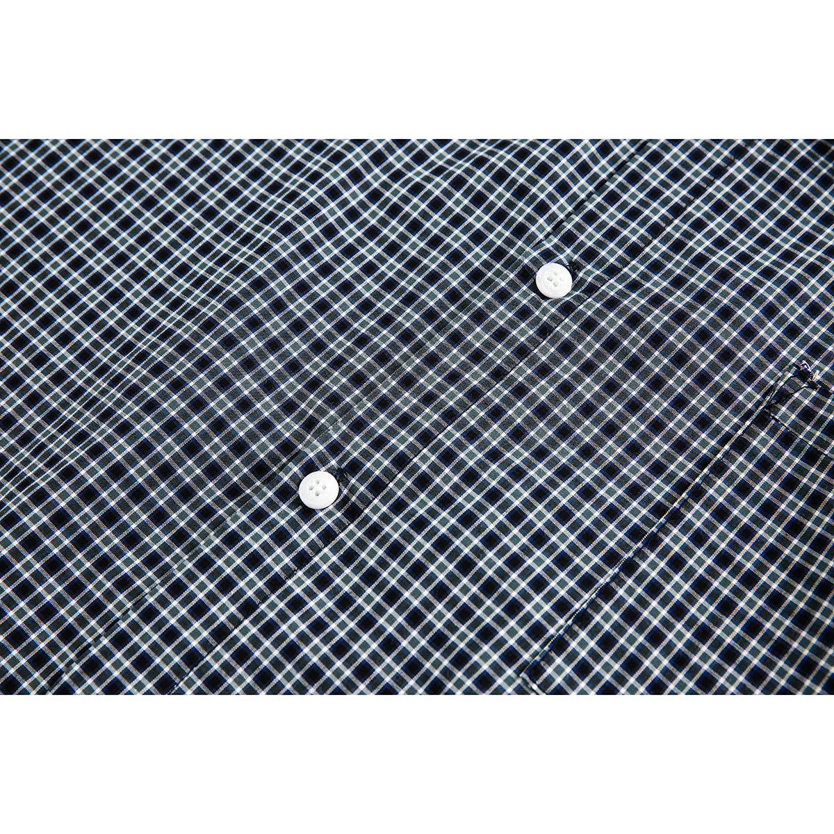 Close-up of black, blue, and white checked shirt fabric with two white buttons and a seam.