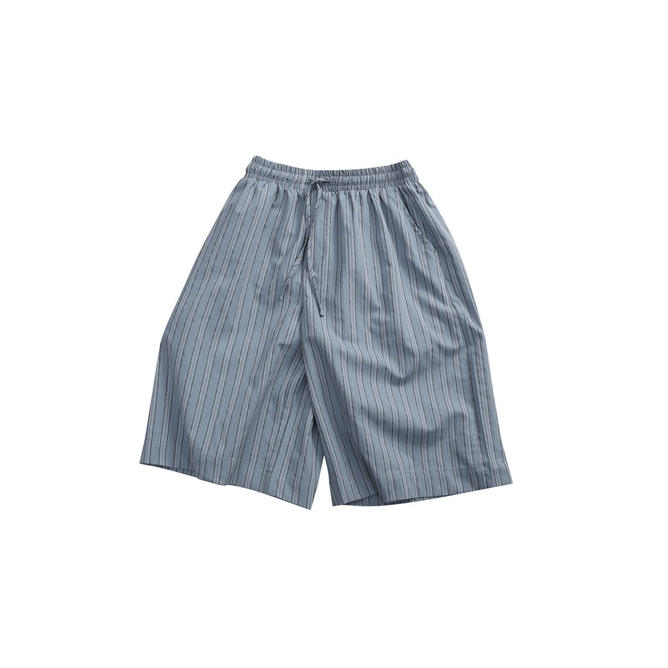 Light blue vertical-striped knee-length shorts with elastic drawstring waistband, flat front view