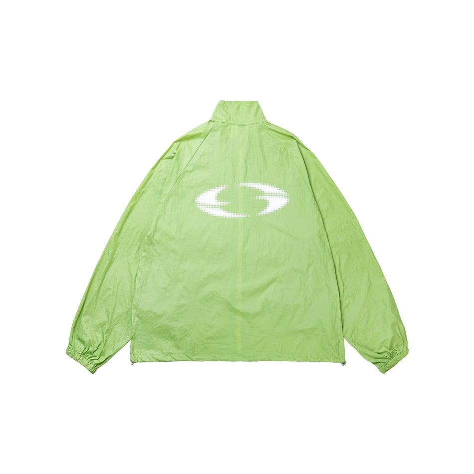 Back view of a light lime-green zip jacket with a high collar, elastic cuffs, and a large white emblem.
