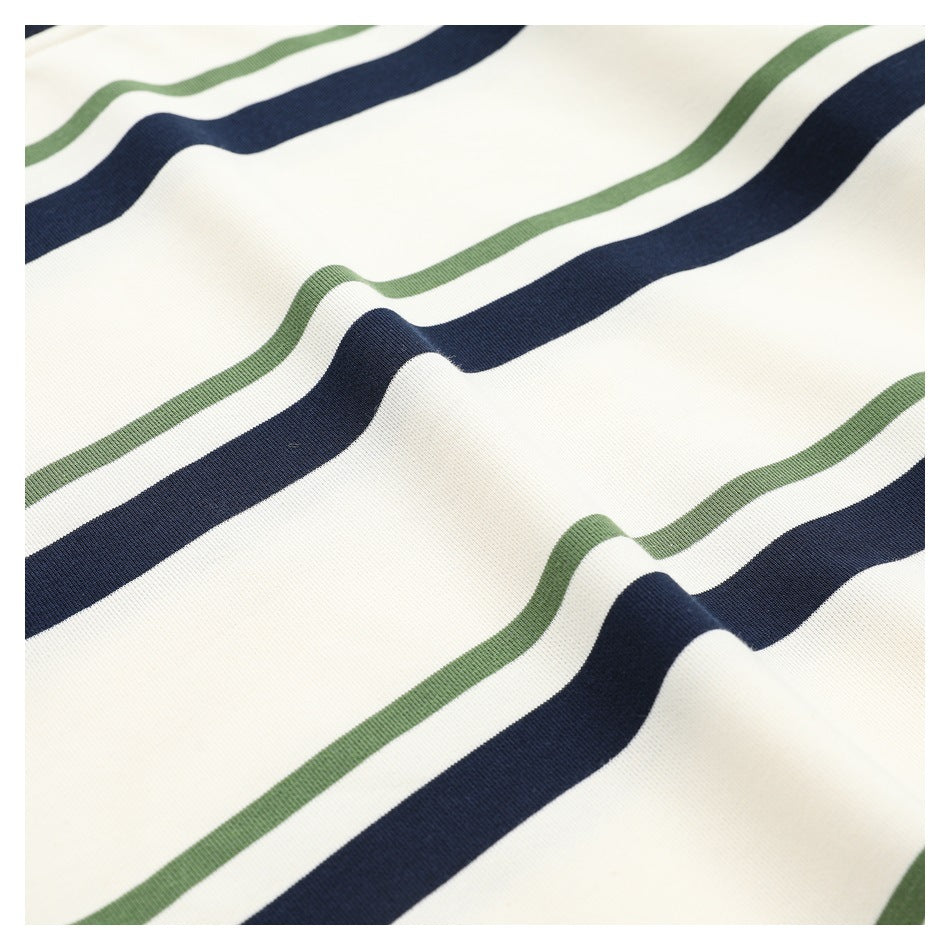 Close-up of the ivory shirt fabric with alternating navy and olive horizontal stripes.