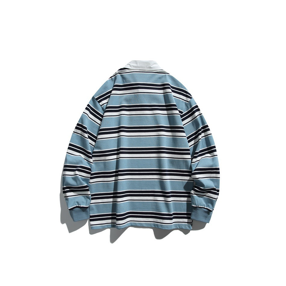 Back view of a long-sleeve rugby shirt with light blue, navy and white horizontal stripes and a white collar.