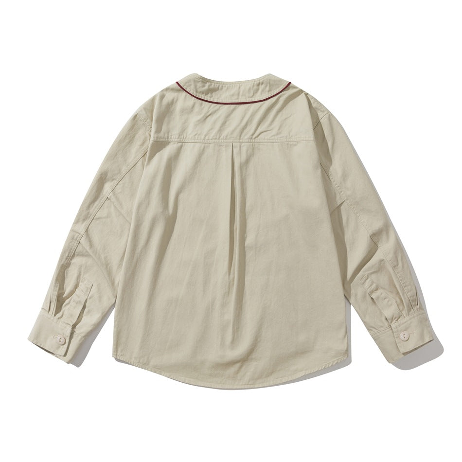 Off-white long-sleeve shirt back view with back yoke, center pleat, burgundy collar piping and cuff buttons