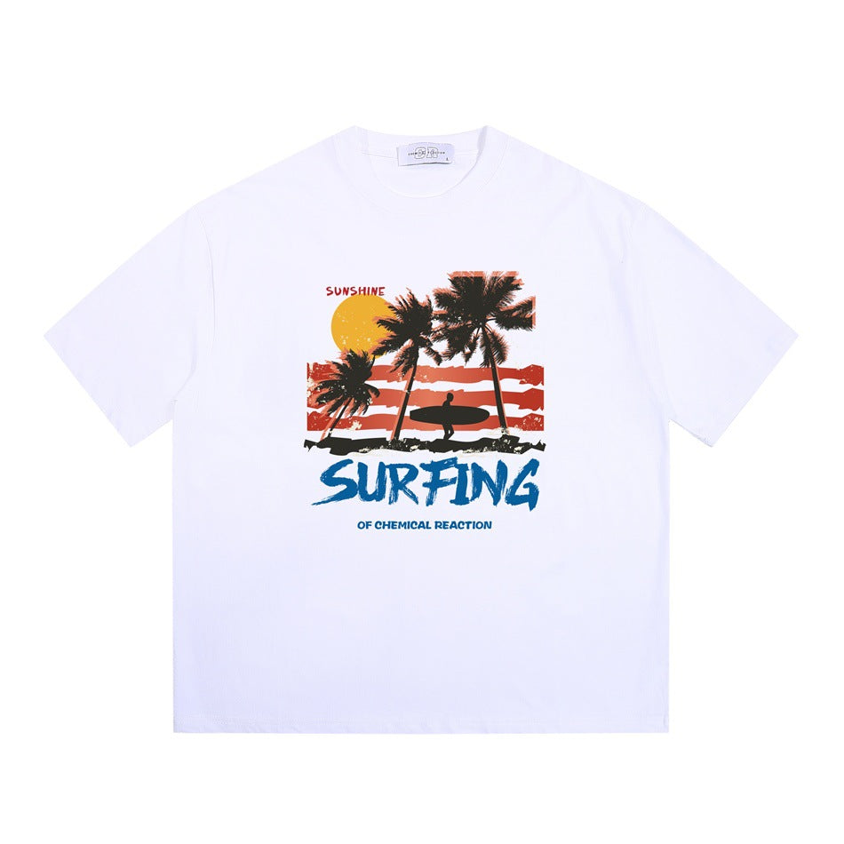 White short-sleeve crew-neck T-shirt with palm tree sunset surfer graphic and blue SURFING lettering