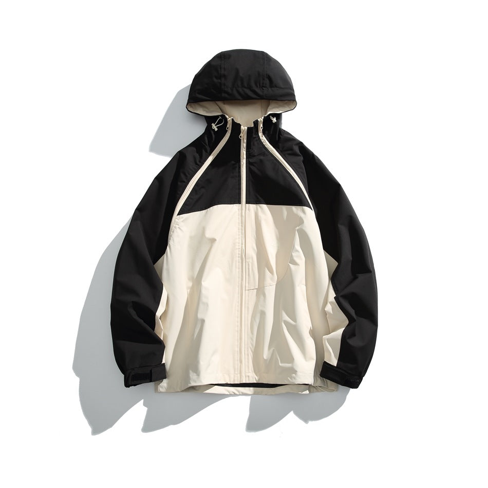 Black and beige hooded color-block jacket with black yoke and sleeves and cream body, flat lay front view