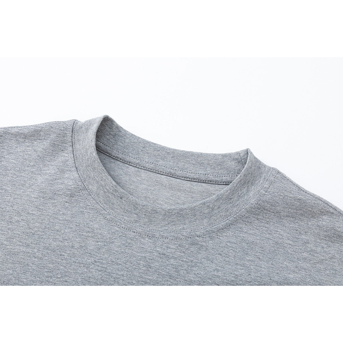Close-up of a heather gray crew-neck shirt showing the ribbed collar and shoulder seams.