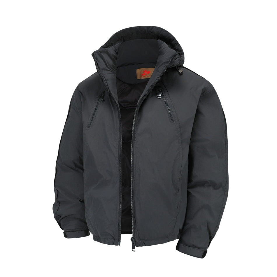 Dark hooded jacket with the front unzipped, showing the black lining, chest zip pockets and cuff tabs