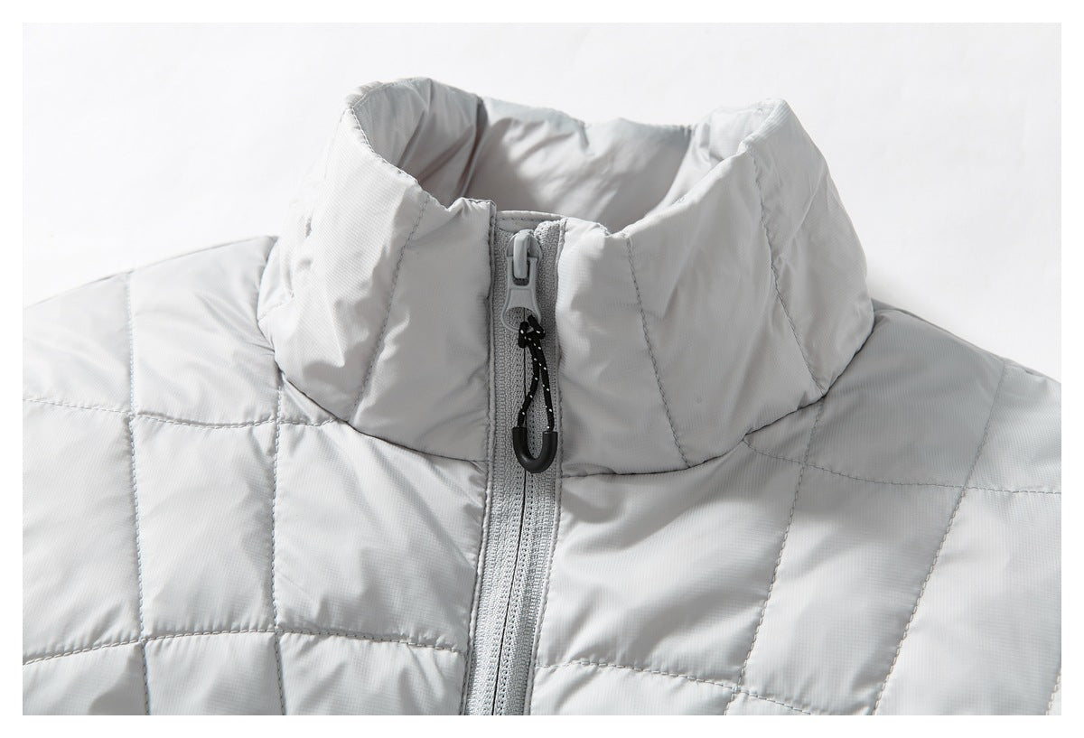 Close-up of the light gray jacket's high collar and front zipper with a black pull cord.
