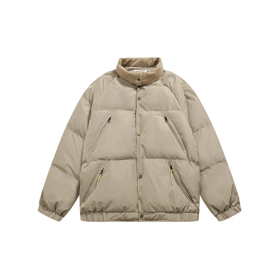 Khaki puffer jacket with tan stand collar, snap front, four zip pockets and elastic cuffs, flat lay front view