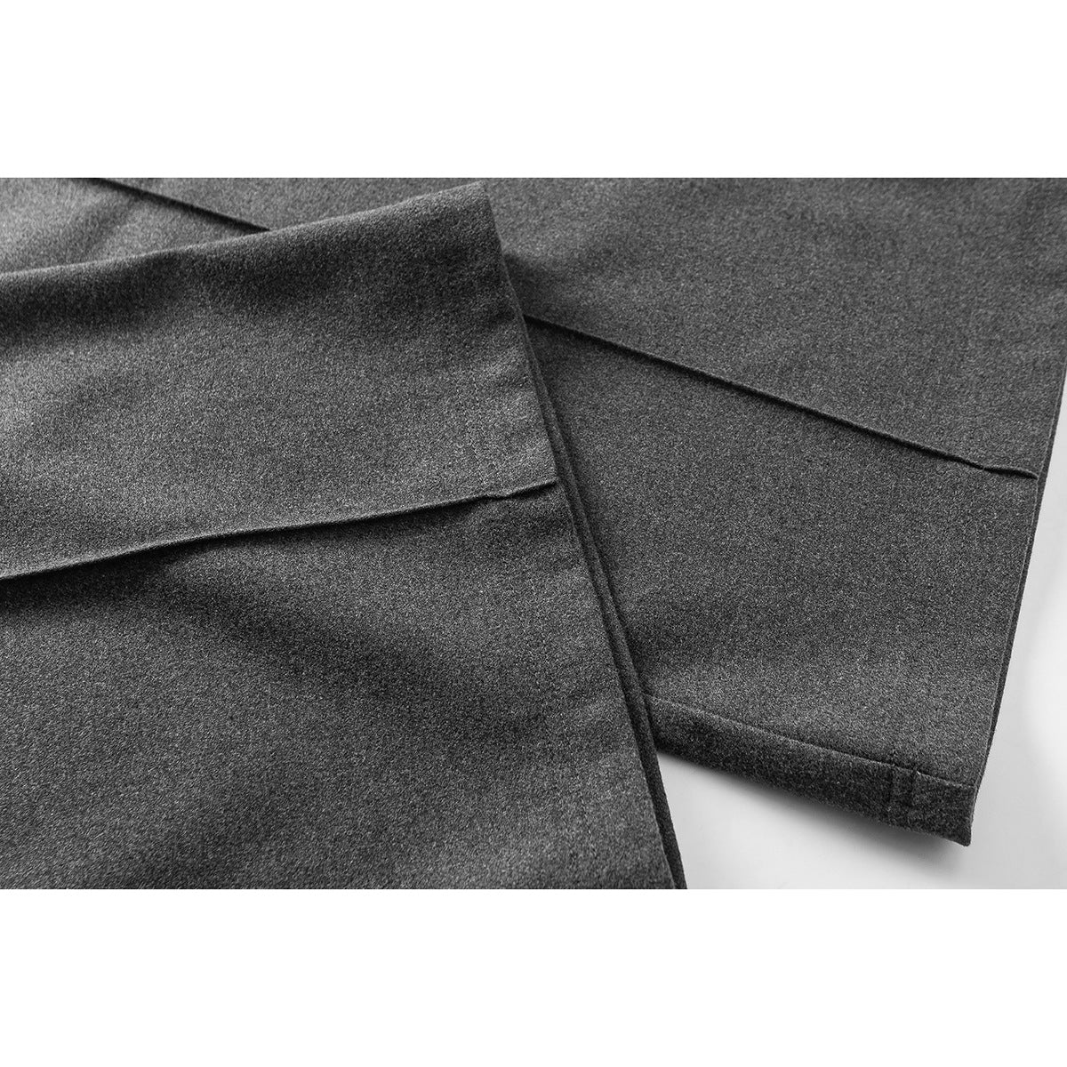 Close-up of charcoal gray pant legs showing the straight hems and fabric surface.