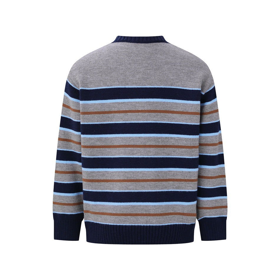 Back of a gray crew-neck sweater with navy, light blue, and rust horizontal stripes and navy ribbed trim.