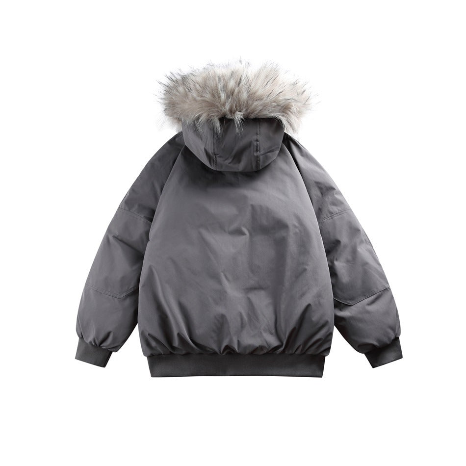 Back view of a gray hooded puffer jacket with gray fur trim and ribbed cuffs and hem.
