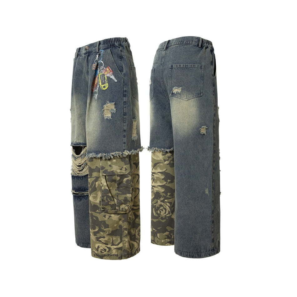 Two angled views of wide-leg faded denim pants with distressed details and camouflage cargo panels on one leg.