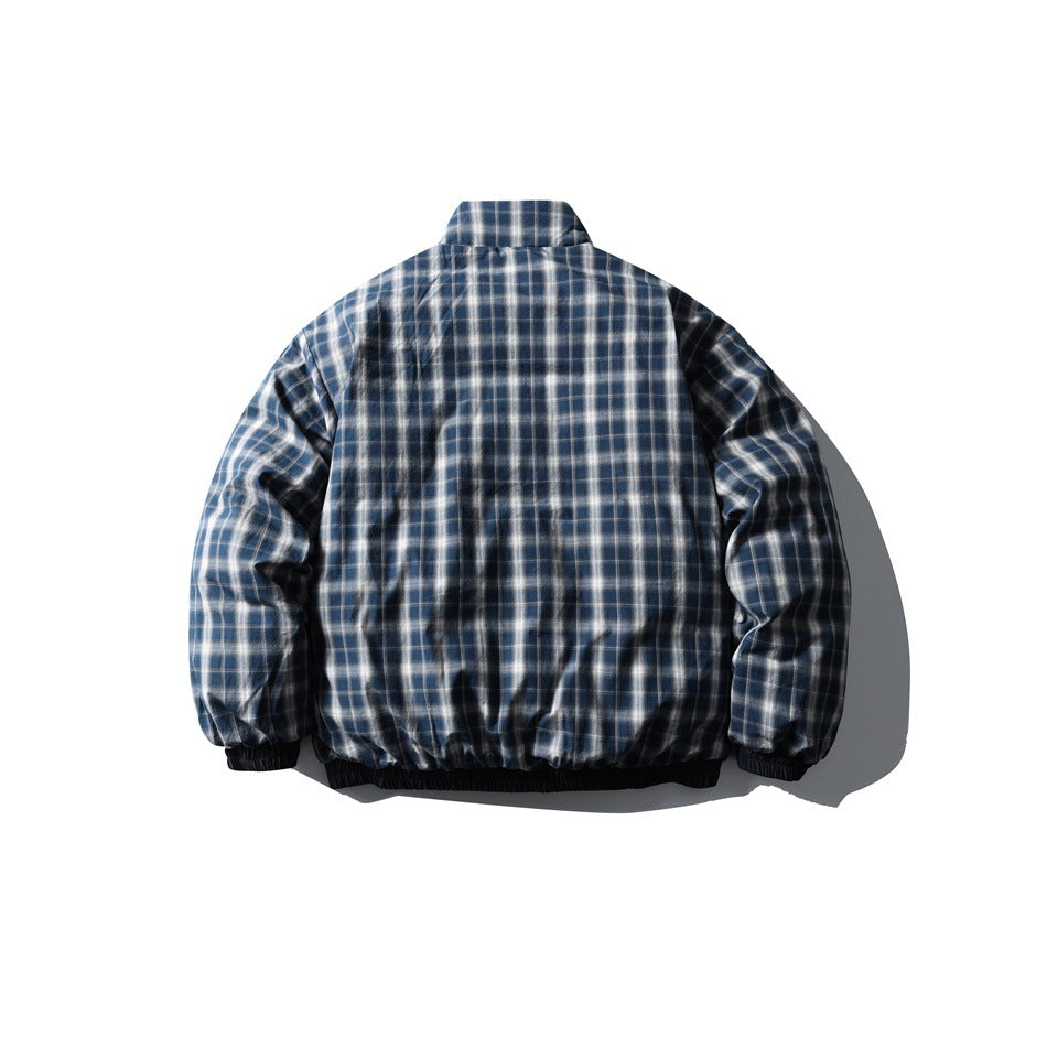 Back view of a blue, gray, and white plaid jacket with a high collar and elastic cuffs and hem.