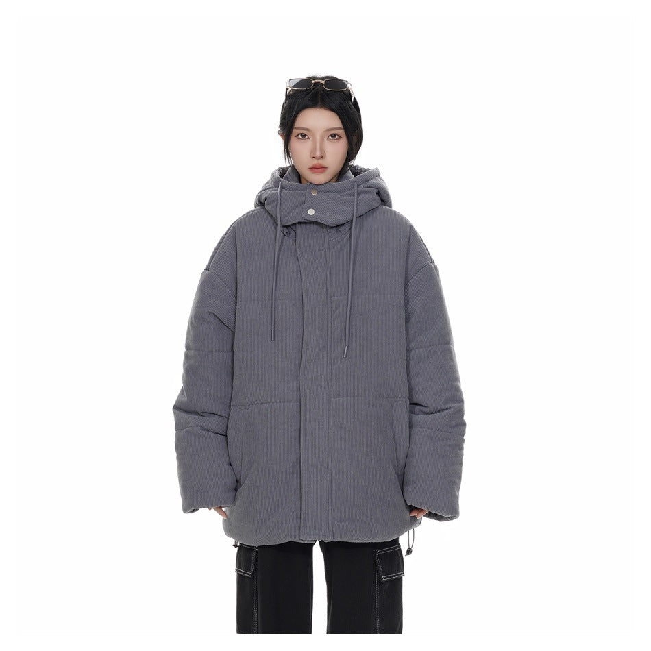 Model wearing a gray hooded jacket with a high snap collar, drawstrings, front closure, and large lower pockets.
