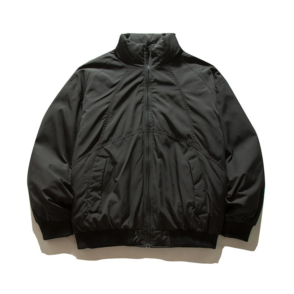 Black stand-collar zip jacket with raglan seams, front pockets and ribbed cuffs and hem, flat lay front view