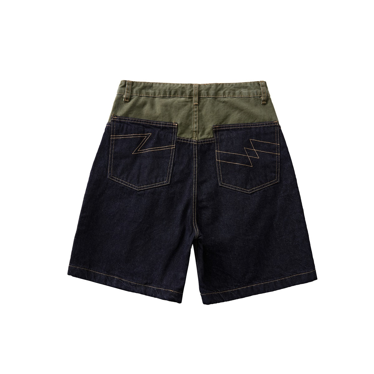 Back view of dark denim shorts with olive green upper panel and two patch pockets with zigzag lightning-bolt stitching