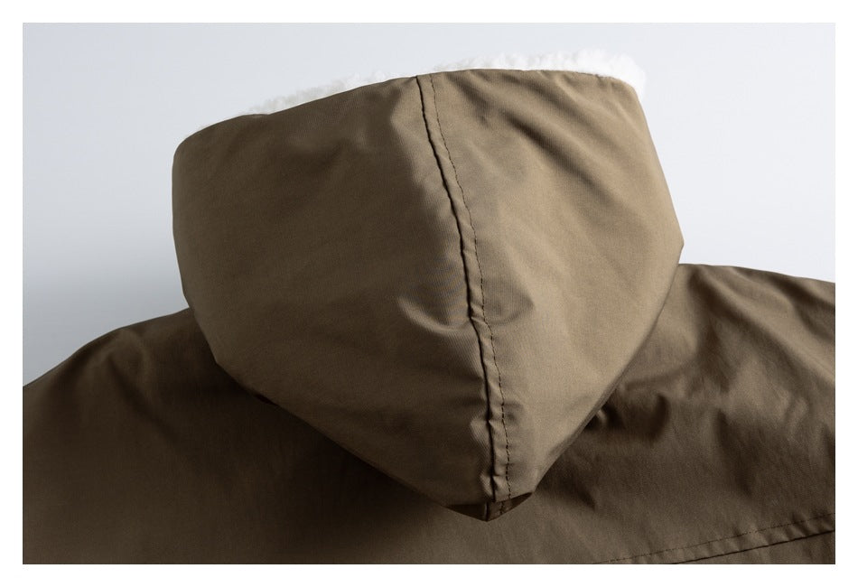 Rear close-up of the jacket's taupe-brown hood, with a center seam and white lining peeking out.
