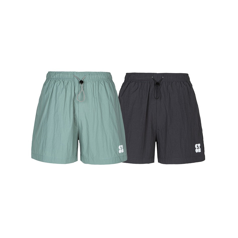 Sage green and charcoal drawstring shorts shown from the front.
