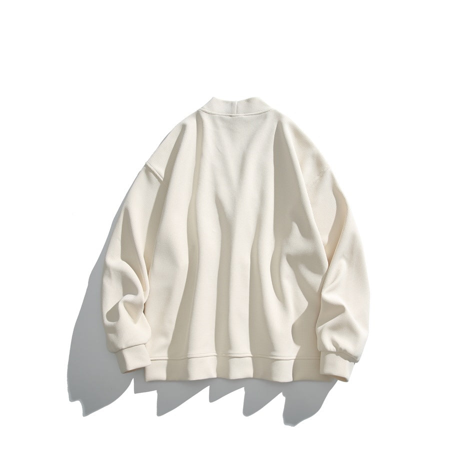 Back view of an off-white loose-fit jacket with a short stand collar, long sleeves, ribbed cuffs and hem.