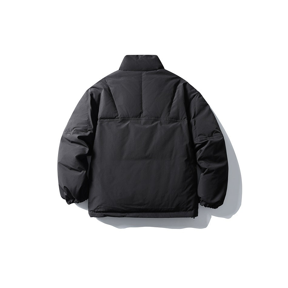 Back view of black stand-collar puffer jacket with seam panels and elastic cuffs