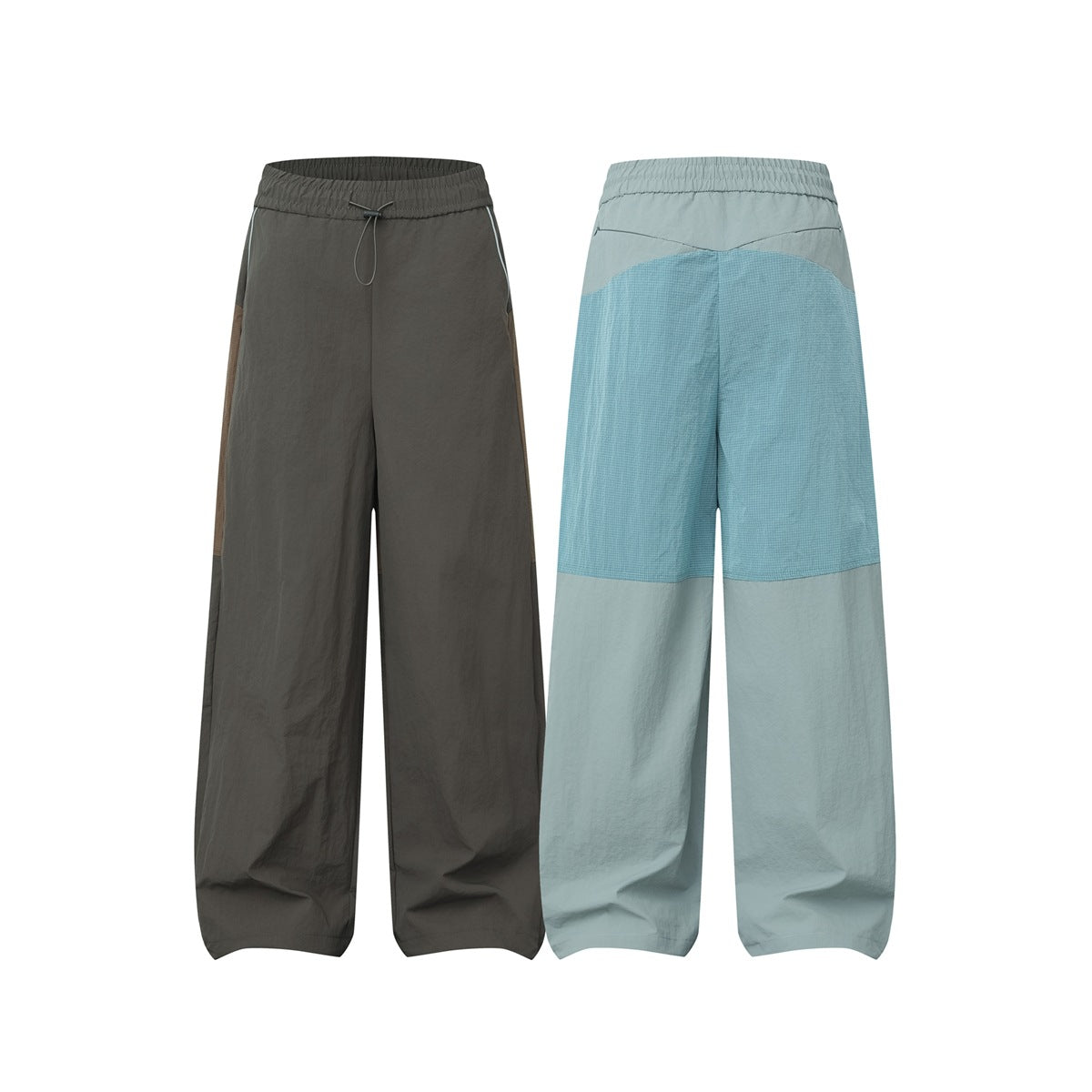Wide-leg drawstring pants shown front and back: a solid charcoal pair and a pale sage pair with blue grid panels.