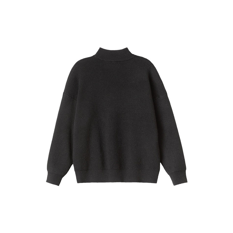 Back view of a black rib-knit sweater with a high collar and long sleeves.