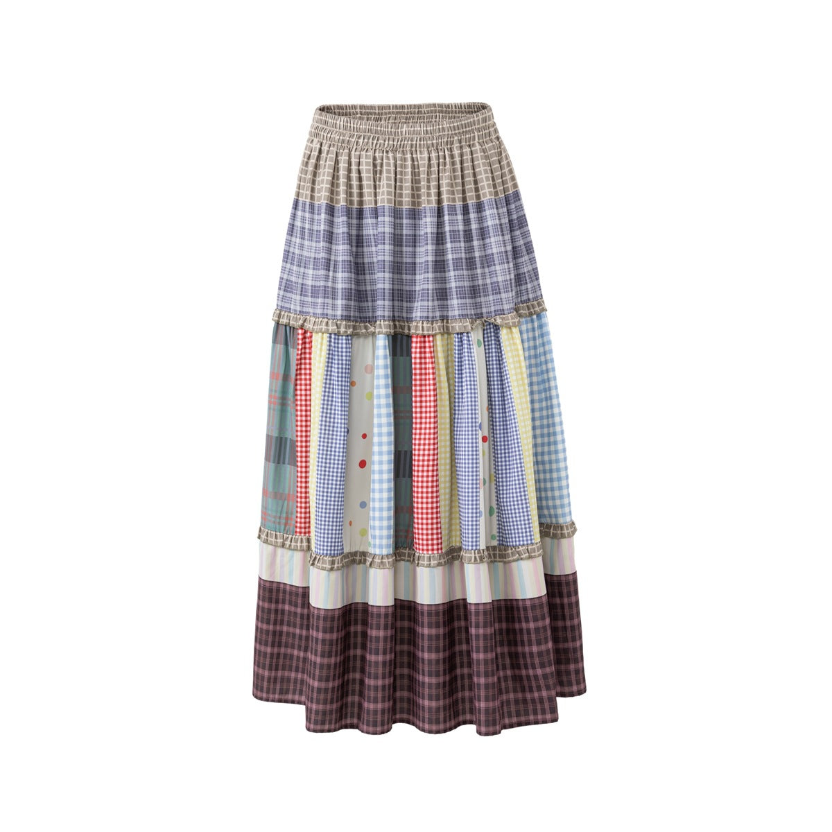 Full-length tiered skirt with an elastic waist and mixed plaid, gingham, dot, and pastel stripe panels.