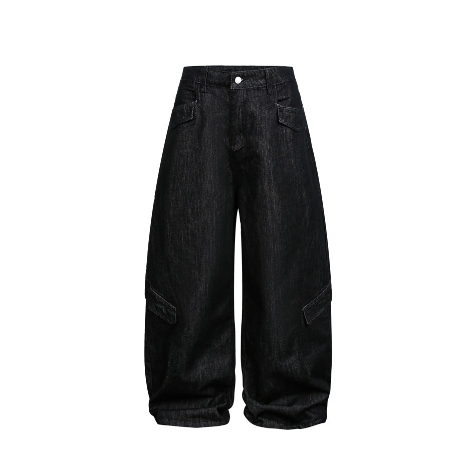 Black washed wide-leg cargo-style denim pants with flap pockets, front view on a white background