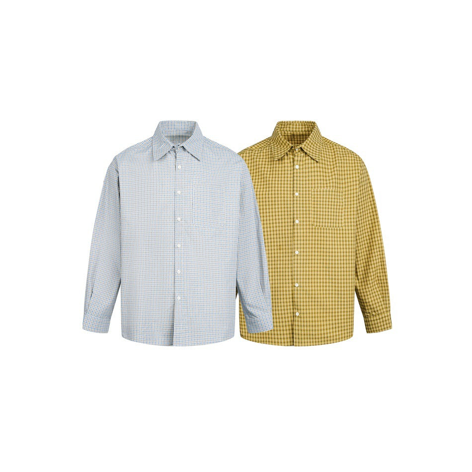 Two long-sleeved button-up check shirts shown on white: one pale blue and one mustard yellow.