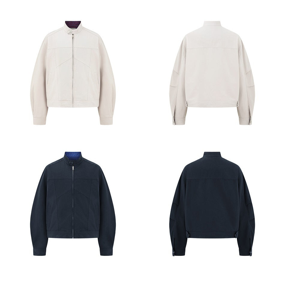 Front and back flat views of the off-white and navy stand-collar zip jackets in a four-panel layout